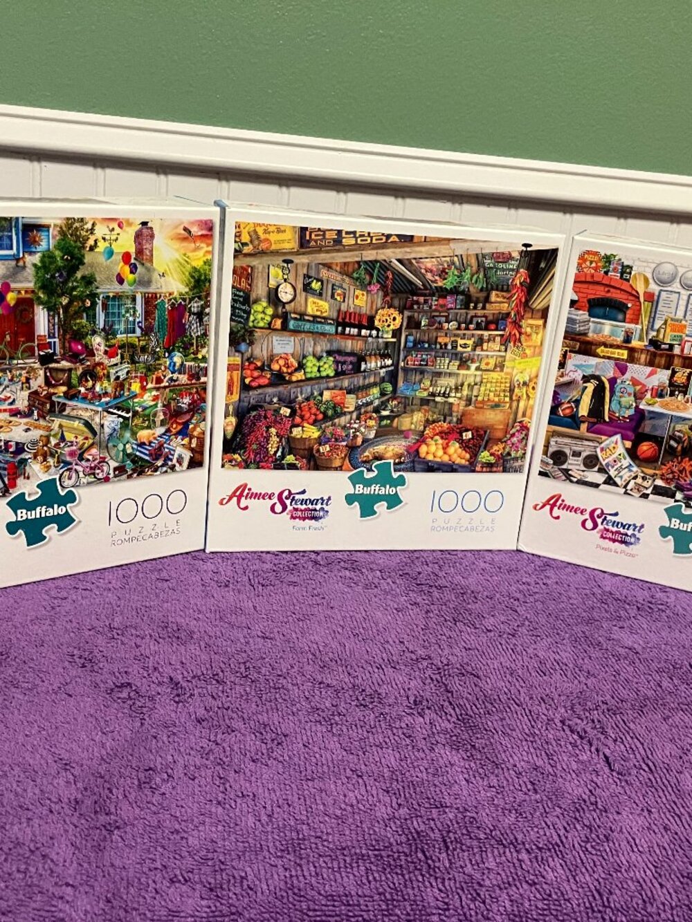A bundle of 3 Buffalo Brand Puzzles - By Aimee Stewart